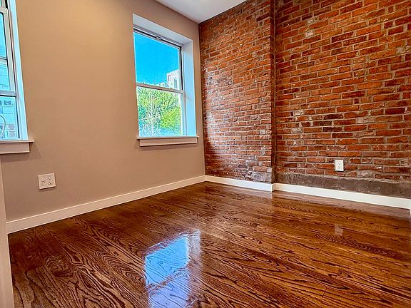 5th image of 215 E 3rd St APT 4F