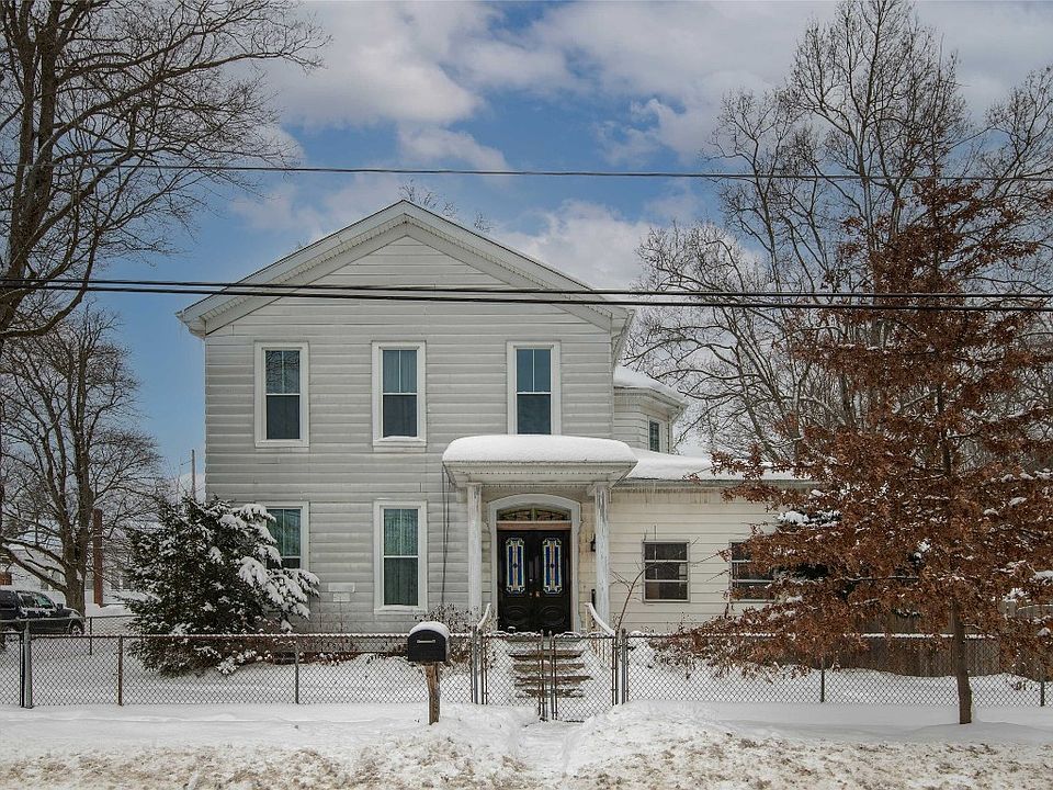 1st image of 104 E 1st St