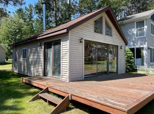 1180 W Higgins Lake Dr, Roscommon, MI 48653