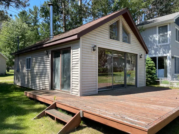 1180 W Higgins Lake Dr, Roscommon, MI 48653