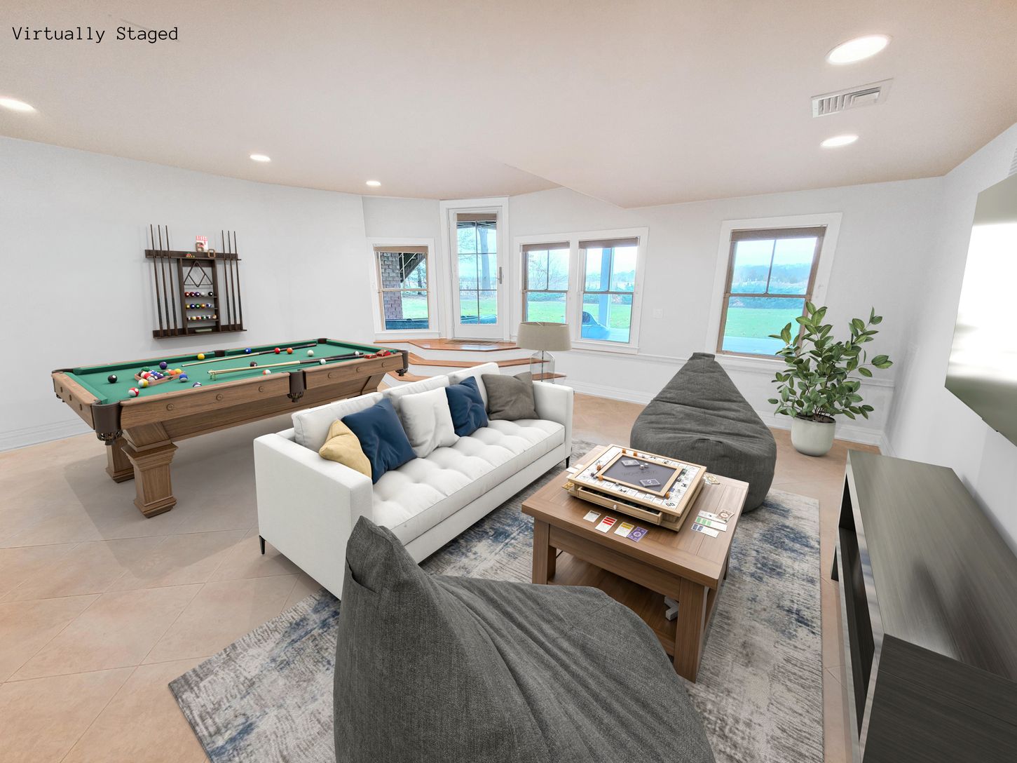 Virtually staged Lower Level Walk Out Recreation Room