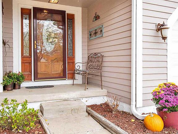 2nd image of 7030 E Woodbury St