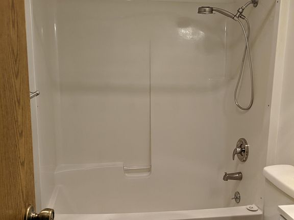 Master bathroom tub/ shower combo.