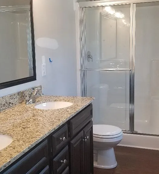 Double Vanity with Granite countertops & walk in shower in Master Bathroom