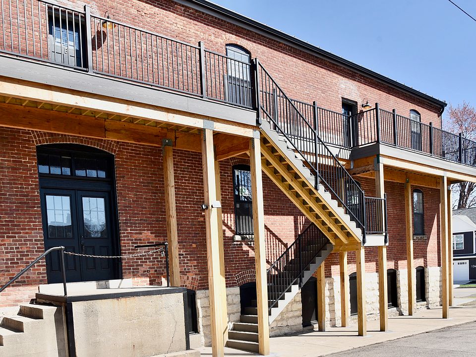 Exterior of Building: The top floor has three apartments and the main floor is a professional space used by the owners.Exterior of building. All apartments are on the second floor and all units have a deck with ample seating.