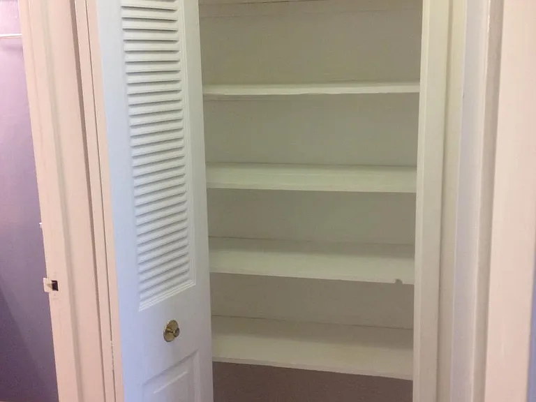 Linen closet, plenty of storage for towels etc.