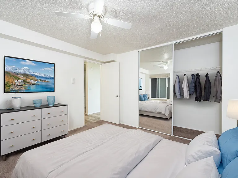 Comfortable Tacoma bedroom with a ceiling fan and oversized closet. Comfortable Tacoma bedroom with a ceiling fan and oversized closet.