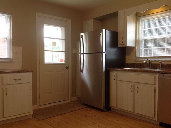 New appliances. Stove, fridge, microwave, and dishwasher.
