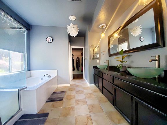 Master bathroom with walk-in closet