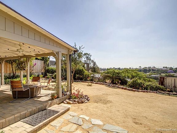 Back, huge 1 bedroom unit with private yard and canyon views galore.