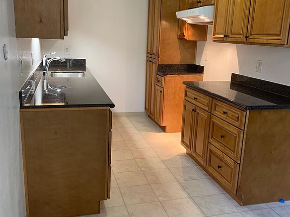 Updated kitchen - New refrigerator and electric stove to be installed 9/11/2021 Upgraded cabinets with lots of storage.