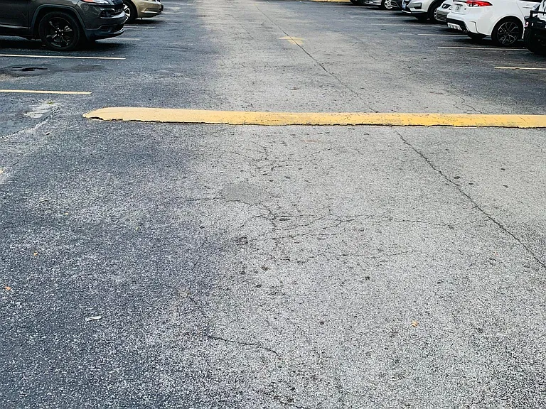 Condominium, Gated Parking Lot.