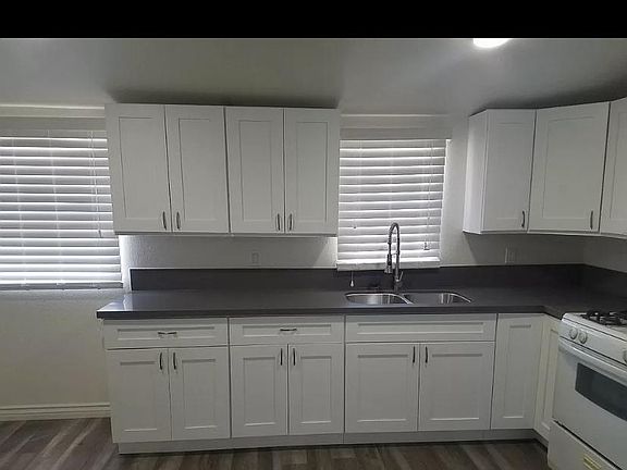 Kitchen table could be placed to the left in this photo. This photo taken from living room. Bathroom door located on left