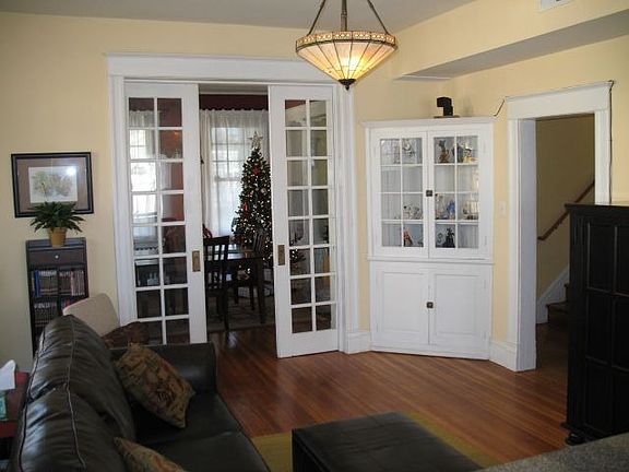 Family Room w/ pocket doors and built in