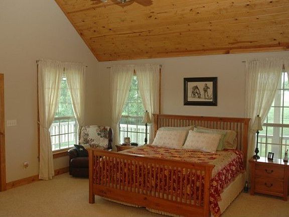 Huge master also has fireplace, opens to front porch.