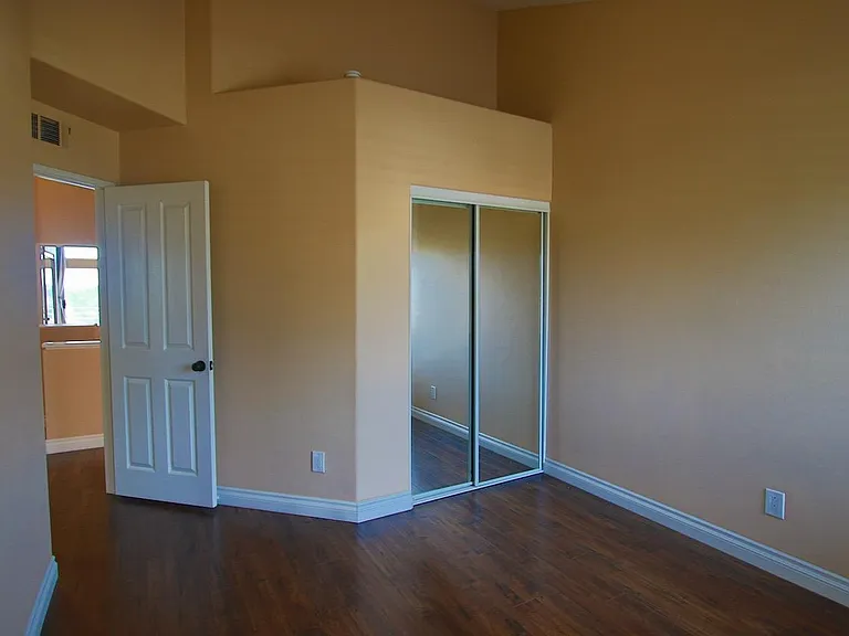 Bedroom 1 with closet and tall ceilings