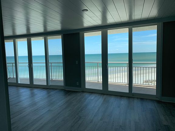 Your evening dining room view. Ceiling to floor patio doors/windows.