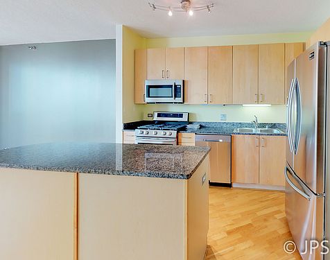 5th image of 600 N Kingsbury St APT 303
