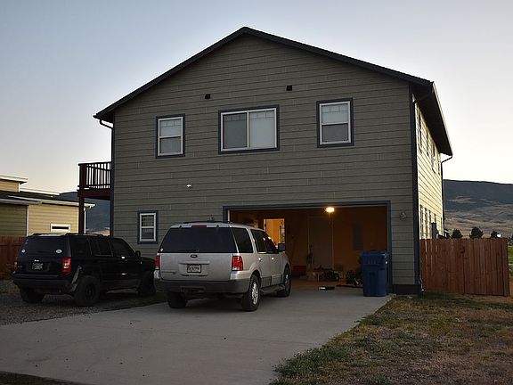 back side, fenced in dog run