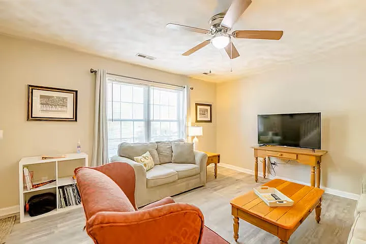 You will feel at home when you walk in. Main floor features, living room, half bath and large fully-equipped kitchen with dining area for five people with doors to back patio.