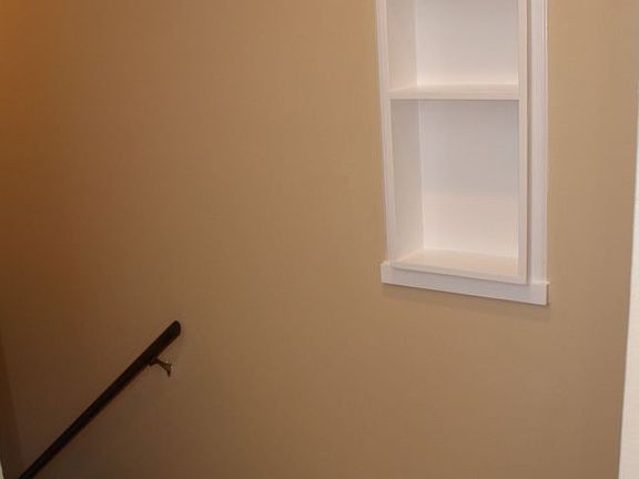 hallway/in wall shelving throughout 2nd story