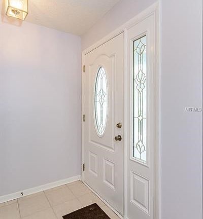 Beautifully Updated Entry Door + Side Light Panel!