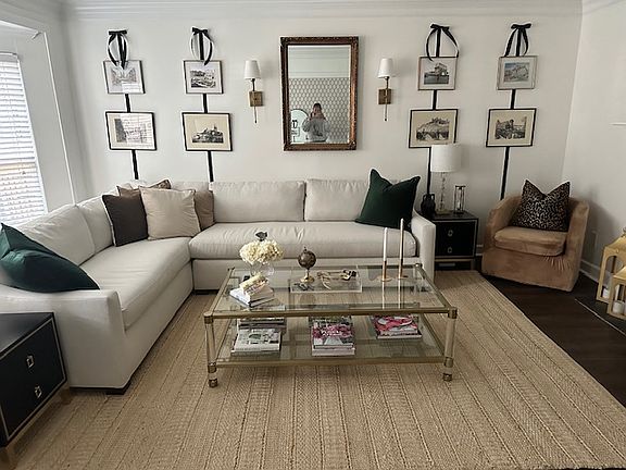 Large living room with ample seating and fireplace.