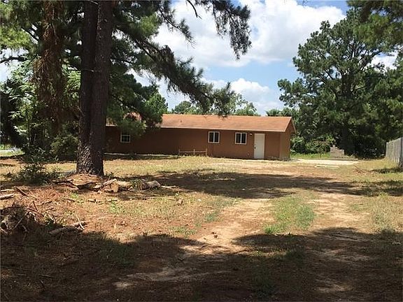 The House sits back on the property