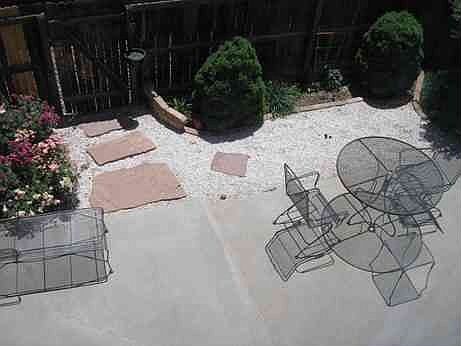 Patio with Rosebushes & Flagstone
