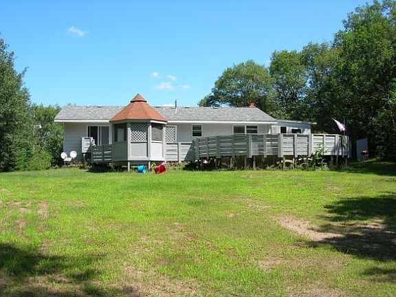 Backyard with pool and hot tub in gazebo