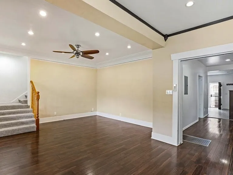 Stairs leading from the living room upstairs