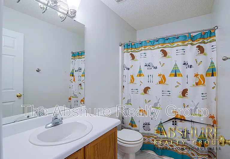 7604 Lilly Pond Ln — Photo 11