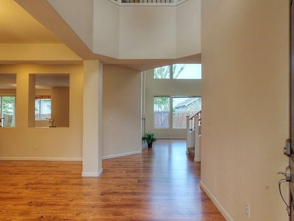 Elegant entry. Formal dining room to the left and straight ahead is the formal living room.