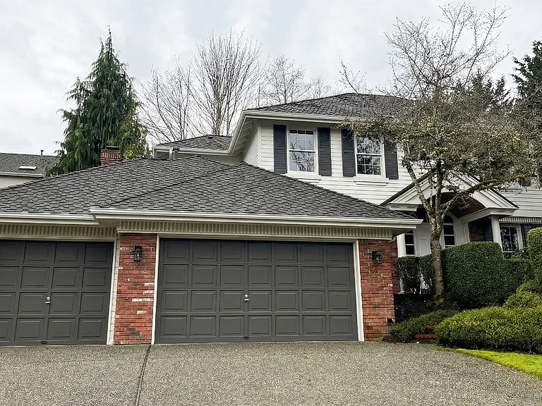 In a quiet cu-de-sac, this lakemont house has an Impressive 3-car garage and grand covered entry featuring brick accents, privacy landscaping, and a stunning vaulted wood-lined porch.