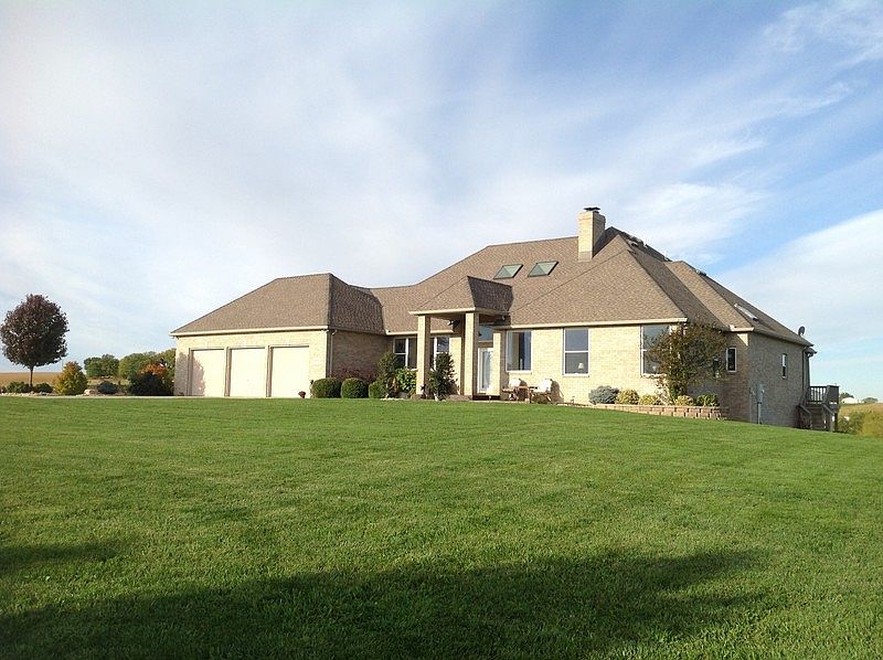 FRONT : AWESOME HOME WITH 3200 SQ. ' FINISHED 1ST FLOOR AND 3200 UNFINISHED LOWER LEVEL.