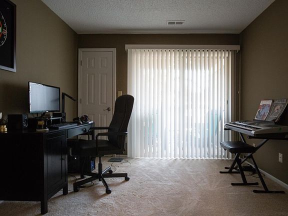 Office with porch access and desktop computer, or space for