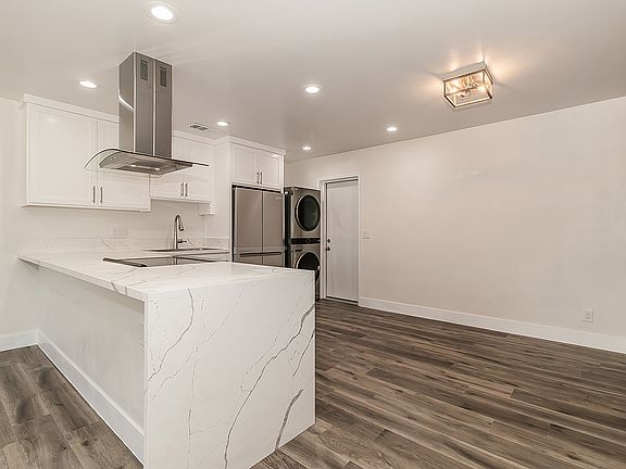 Luxury Kitchen and High End Appliances, LVP flooring, LED lighting.