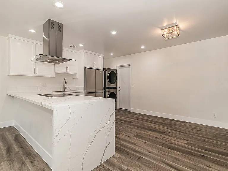 Luxury Kitchen and High End Appliances, LVP flooring, LED lighting.