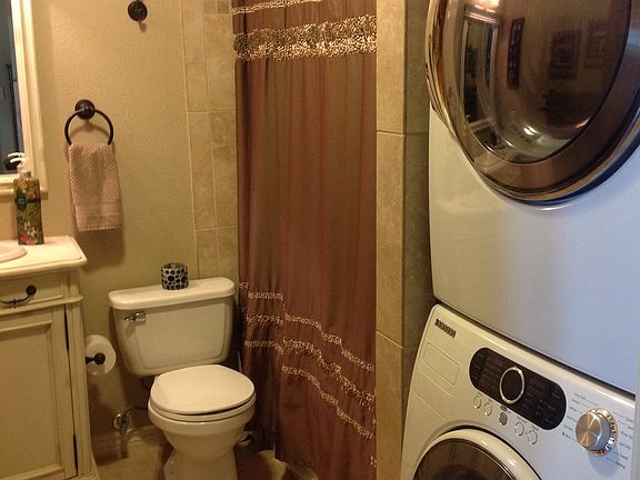 Guest bathroom with laundry 