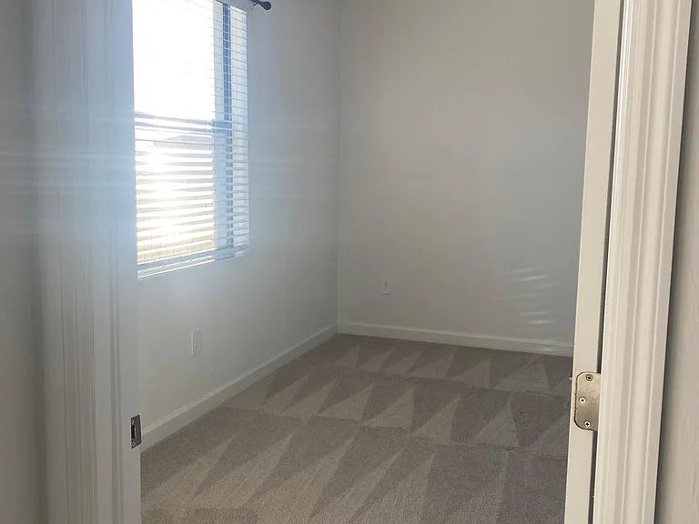 Primary bedroom with installed fan