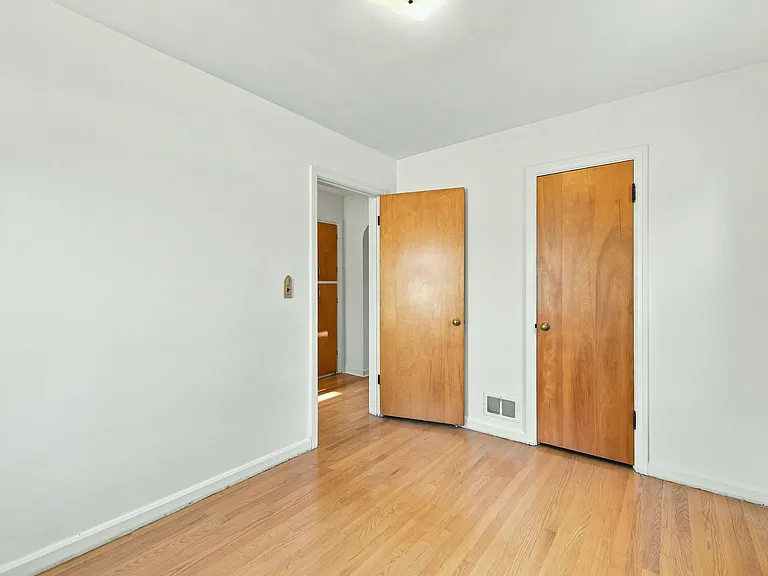 Guest bedroom with a big closet.