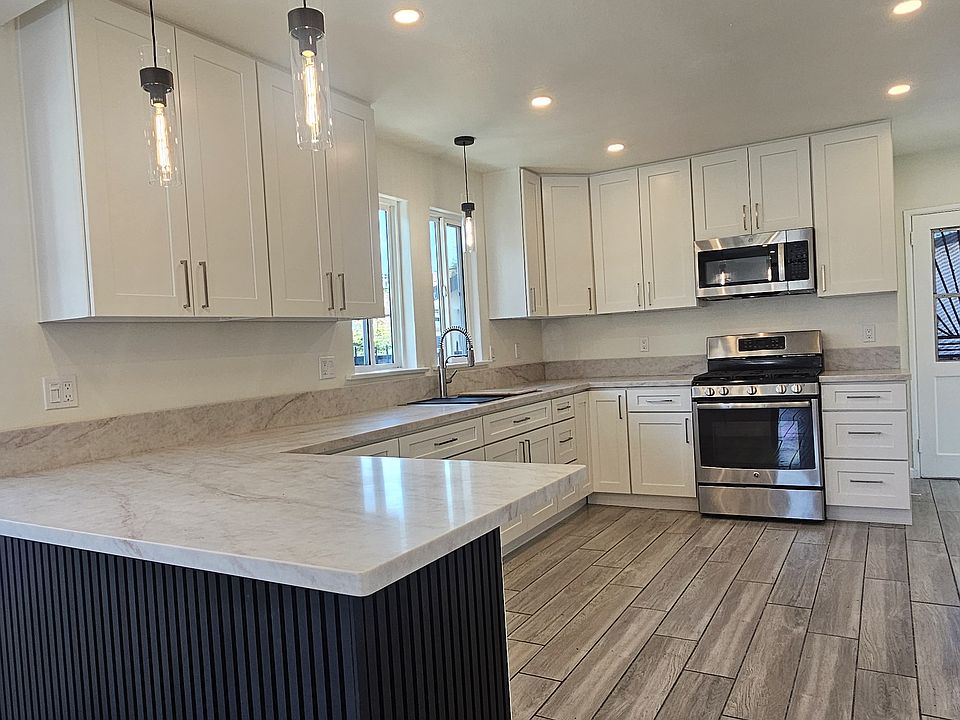 Remodeled kitchen with recess lighting