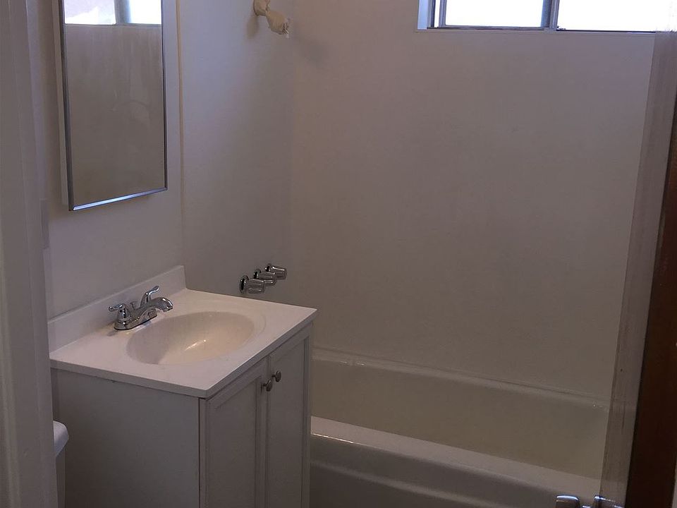 Clean bright bathroom with new toilet installed