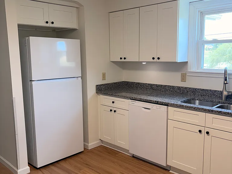 kitchen with new cabinets and granite countertops