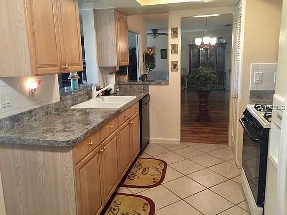 Kitchen light & bright with pass thru to Familyroom & easy access to Diningroom