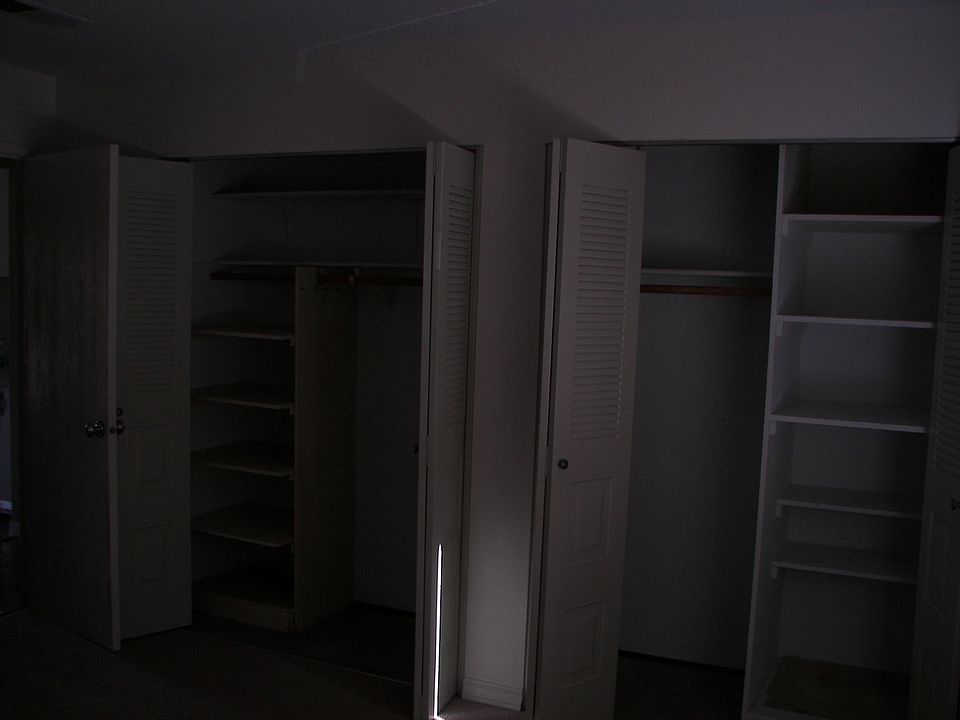 Twin closets in bedroom
