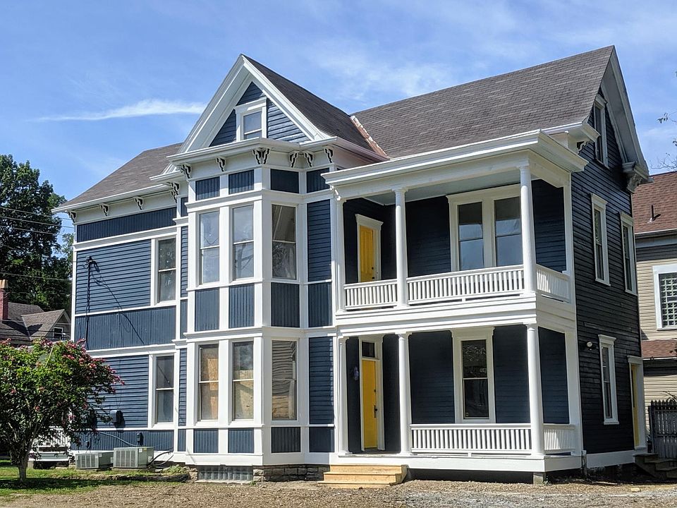 Fresh new exterior! Repaired, designed, and painted with TLC. The dirt shown has now been seeded for grass, and concrete is being poured for fresh new walkways. A new Sweetbay Magnolia Tree will also be planted before the end of Oct.