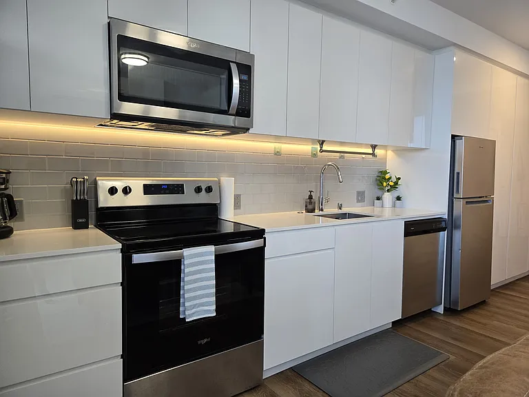 Modern kitchen with stainless steel appliances
