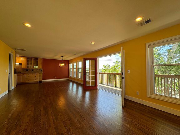 View from the living room. French doors open onto back deck.