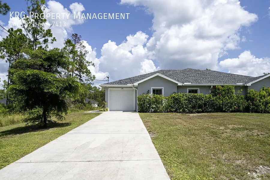 Beautiful 2BR/2BA Duplex with Garage & Modern Finishes in Lehigh Acres! — Photo 1